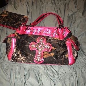 Camo and pink cross purse and wallet.
